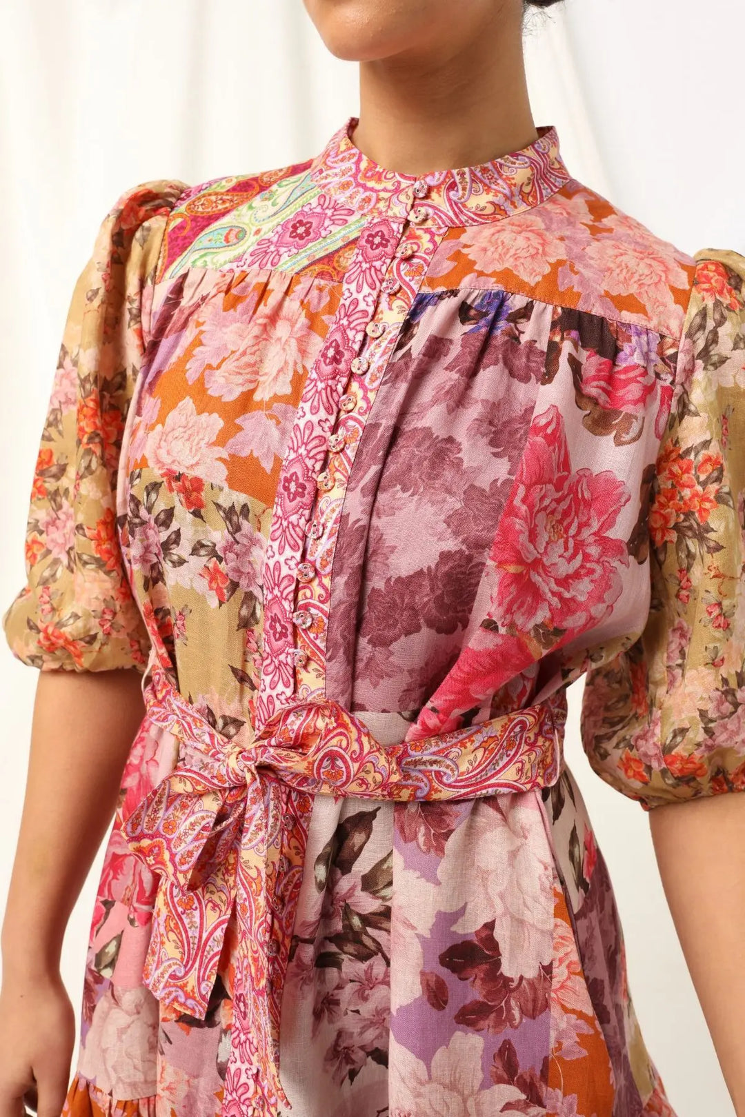 Multicolored floral dress with a white background