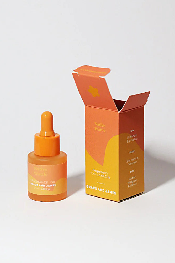 Fragranced oil dropper bottle and packaging on a white background