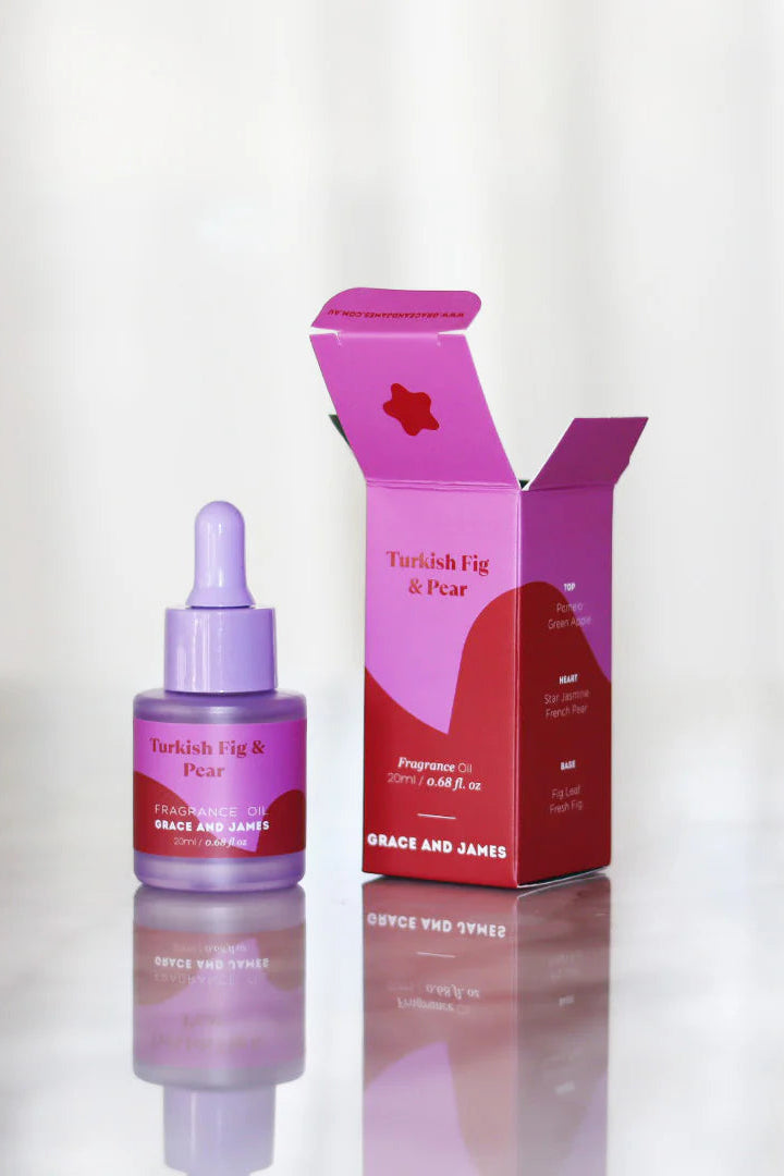 Bottle and box of Turkish Fig & Pear fragrance oil by Grace and James on a white background