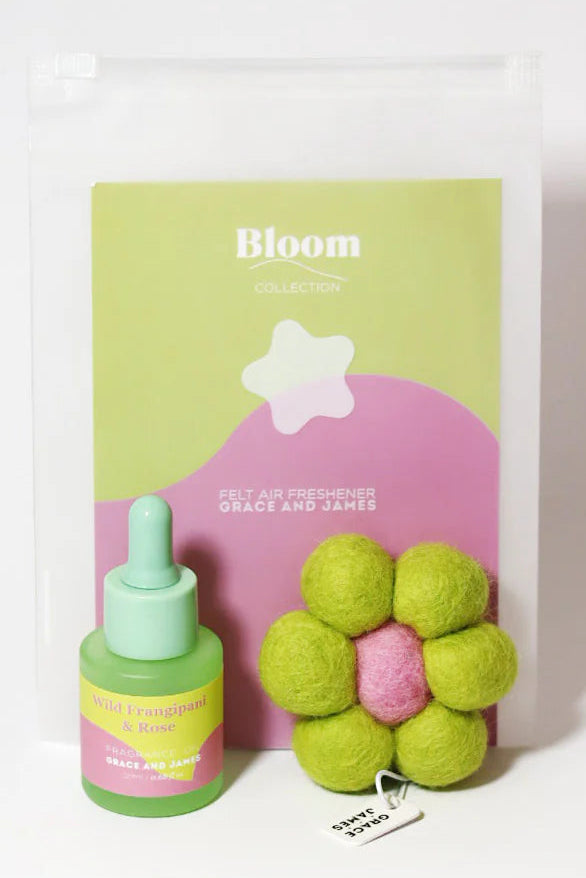 Green and pink fragranced oil set flower shaped felt air freshener with 'Bloom' packaging on a white background