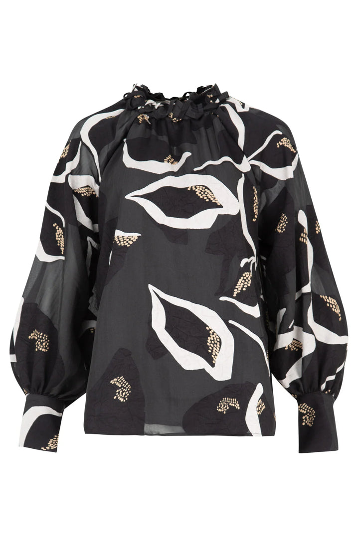 Black blouse with white and gold lip designs on a white background
