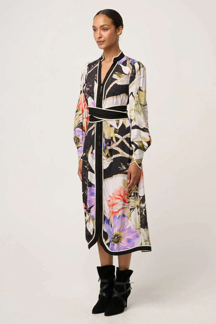 Woman wearing a floral dress with a white background