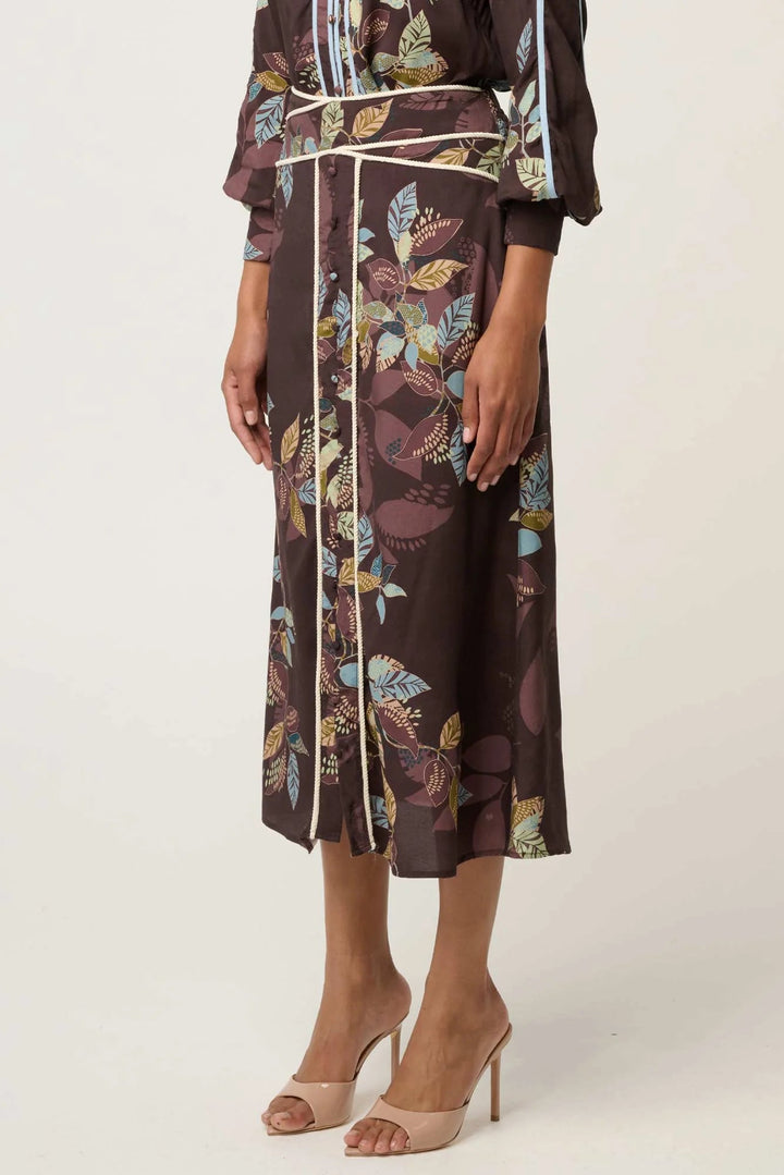 Floral patterned kimono-style garment on a plain background