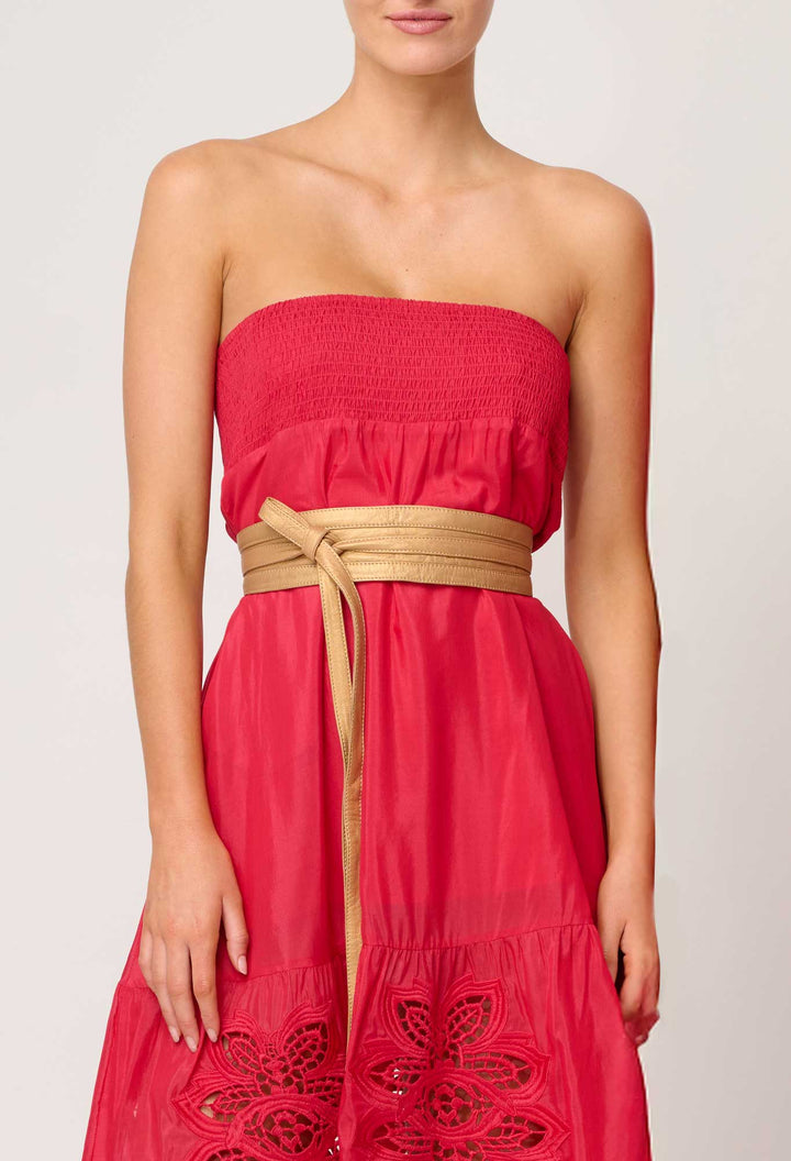 Red strapless dress with a gold belt on a white background . Once Was Milton Belt Gold.