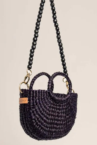 Black woven handbag with a chain strap on a beige background - Orange Inca The New Mini Fiesta Bag Black