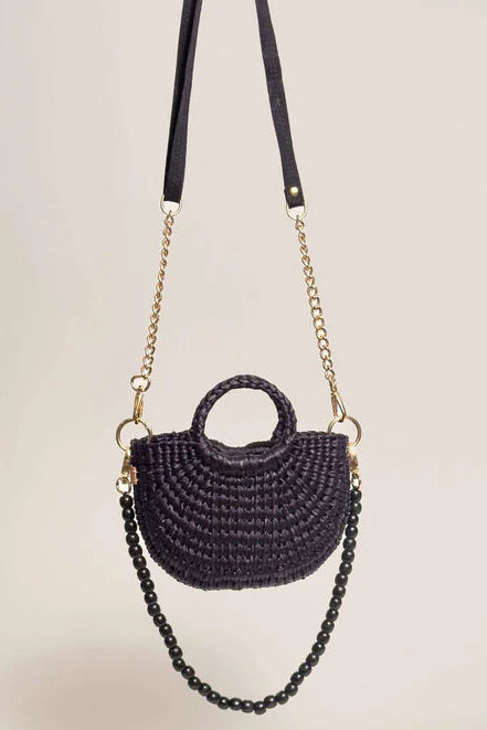 Black woven handbag with a chain strap on a beige background - Orange Inca The New Mini Fiesta Bag Black