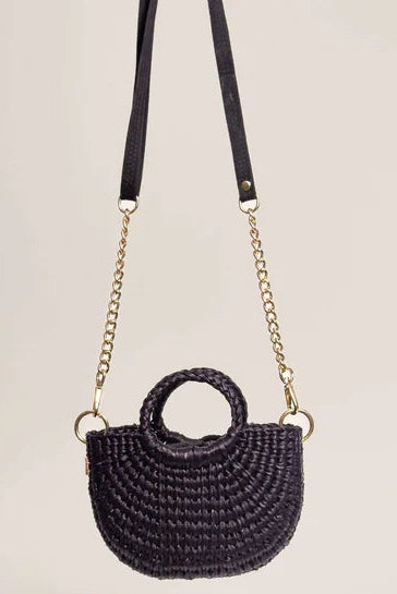 Black woven handbag with a chain strap on a beige background - Orange Inca The New Mini Fiesta Bag Black