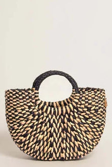 Woven handbag with a black handle on a light beige background. Orange Inca The New Mini Fiesta Bag Marbled Black