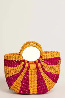 Woven handbag with a circular handle on a light beige background. Orange Inca The New Mini Fiesta Fuschia Yellow Stripe