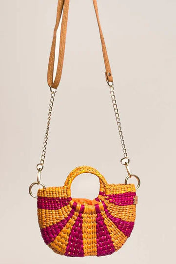 Woven handbag with pink and yellow design on a beige background. Orange Inca The New Mini Fiesta Fuschia Yellow Stripe