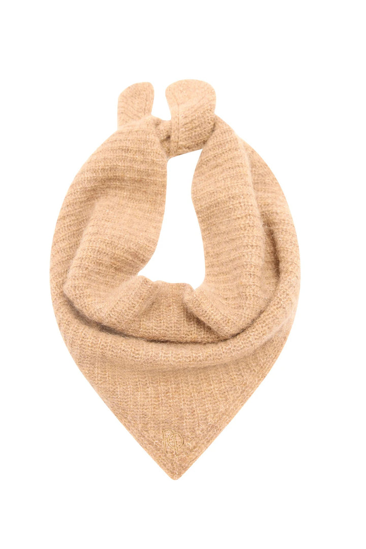 Beige knitted baby bib on a white background