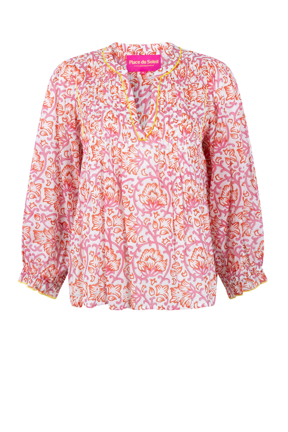 Floral patterned blouse on a white background