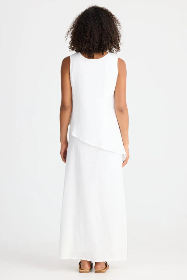 Woman wearing Shanty Corporation white sleeveless Grace dress on a white background