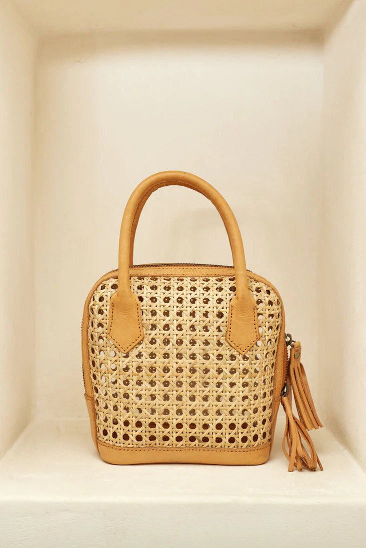 Woven handbag with leather accents on a neutral background - State of Embrace Bowling Bag Tan