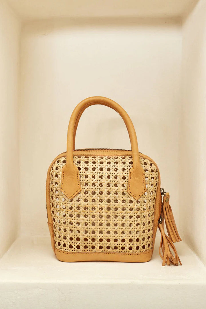 Woven handbag with leather accents on a neutral background - State of Embrace Bowling Bag Tan