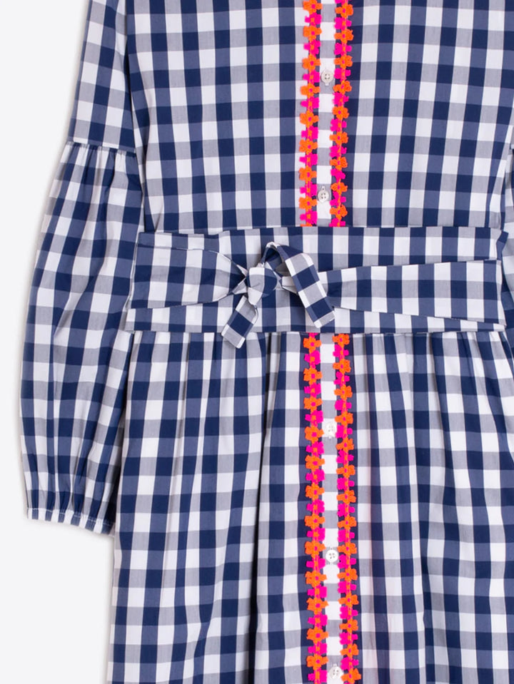 Navy and white checkered dress with colorful trim on a white background