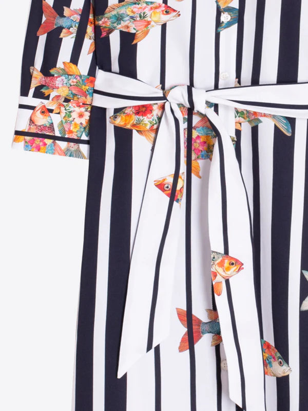 Striped garment with colorful fish patterns on a white background
