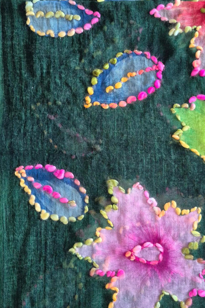 Colorful floral patterned fabric on a white background