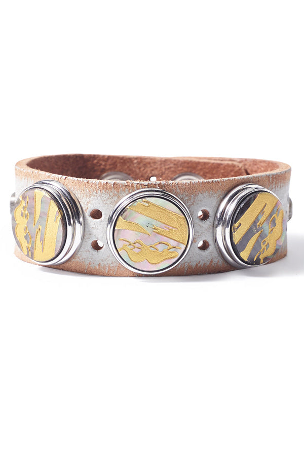A Noosa Amsterdam bracelet featuring a combination of brown leather, metal, and mosaic tiles with a serene multicolor design.